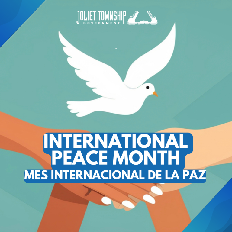 A white dove is flying above hands of different colors and the words "International Peace Month" in English and in Spanish.